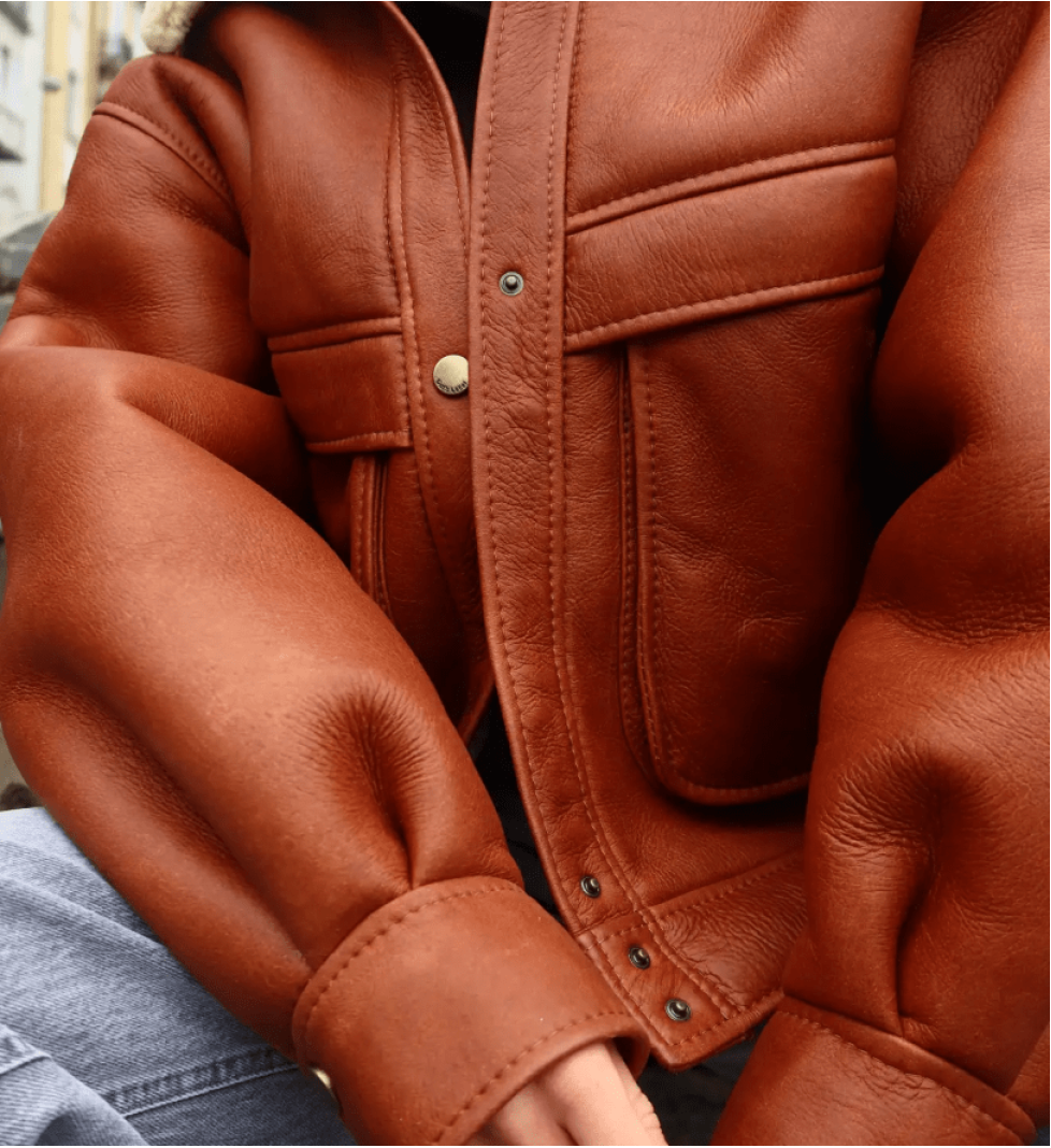 GOT'S LABEL long sheepskin coat with pockets and stand-up collar orange