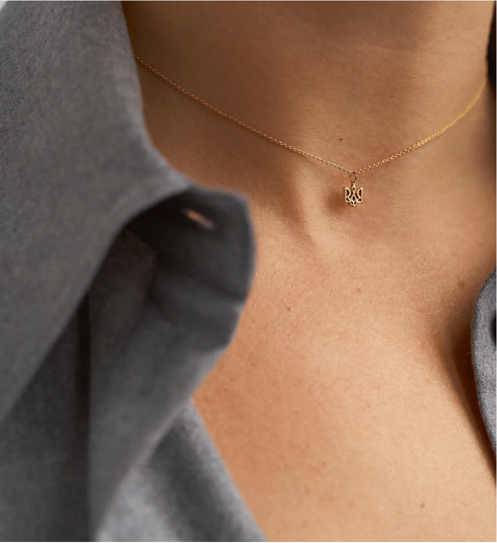 GUZEMA necklace with a trident on a chain Gold