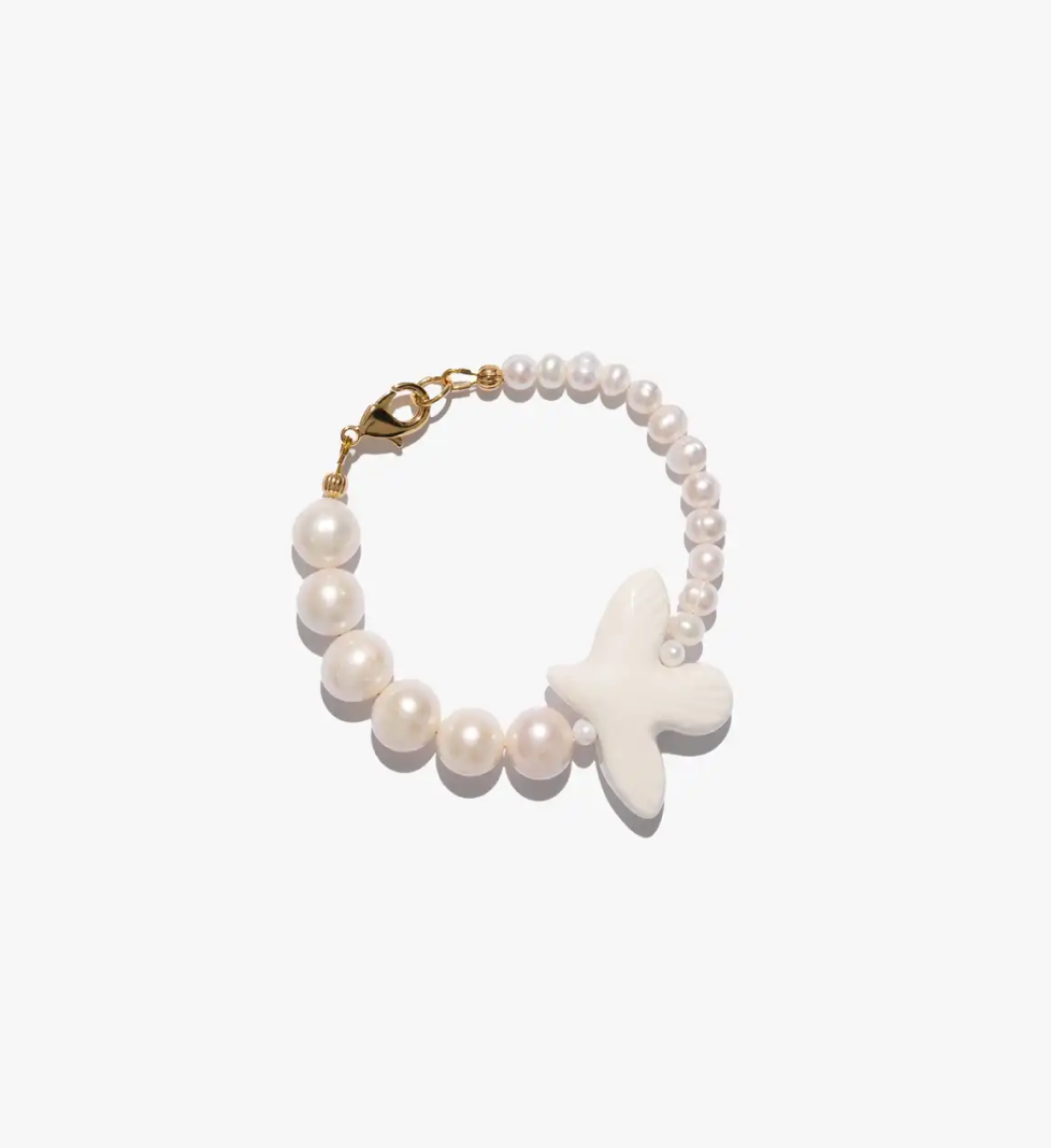 TSVITE TEREN MYRNI Bracelet with two types of pearls and a bird in golden