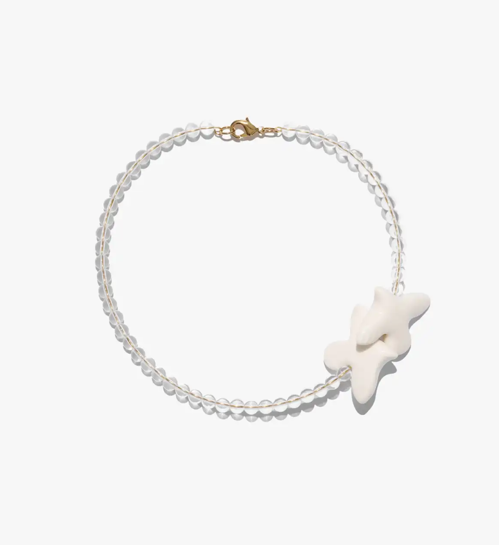 TSVITE TEREN MYRNI Necklace with rock crystal and a bird in golden